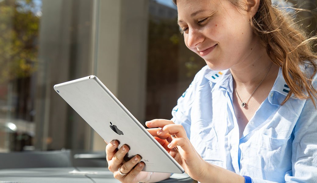 Woman shopping online on iPad