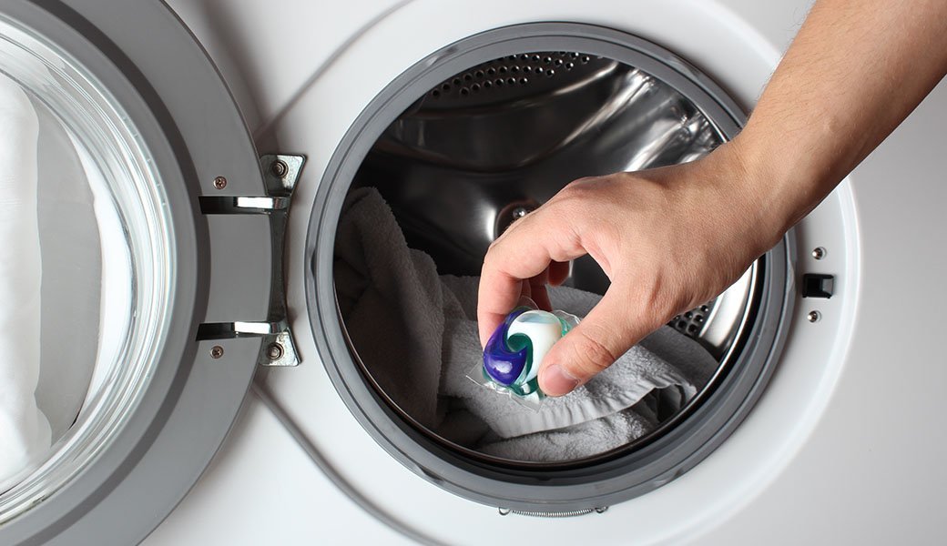 The Benefit Of Throwing Your Detergent Lid In With Your Load Of Laundry