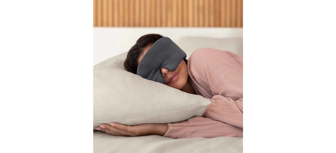 Person sleeping with Baloo Weighted Silk Sleep Stone Mask on