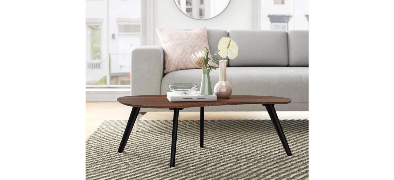 Mercury Row Campanelli Coffee Table on area rug in living room