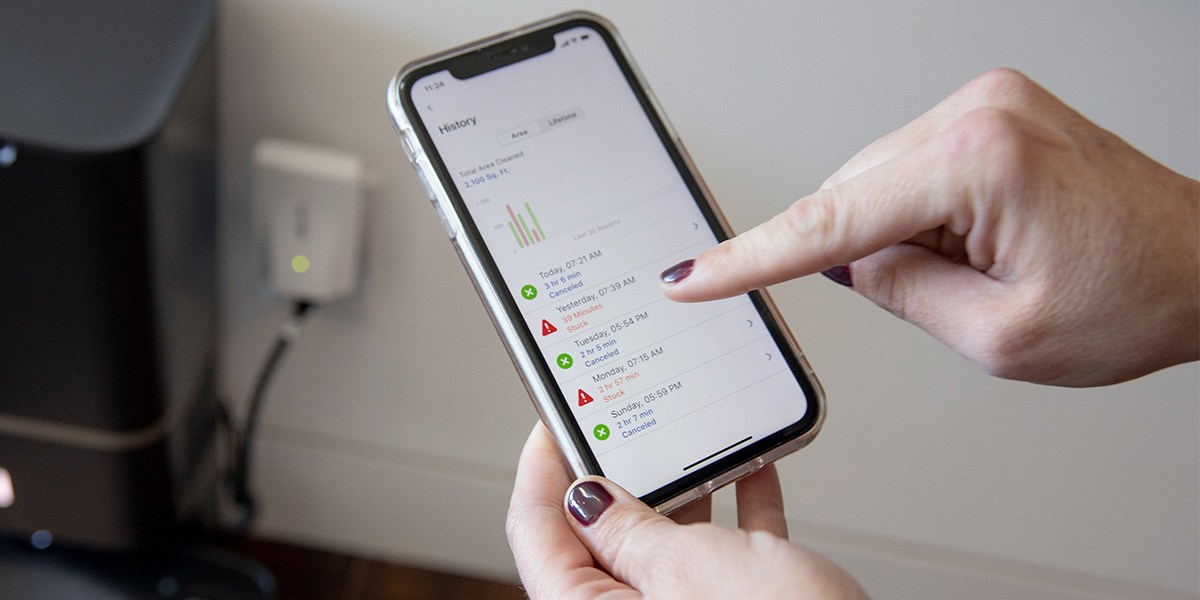 Person using iRobot app