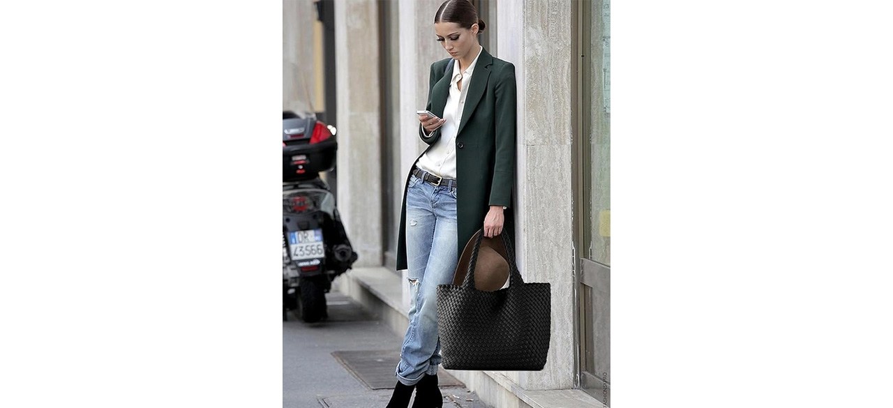 Woman holding SporGenius Woven Tote Bag