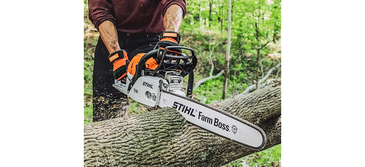 Person using Stihl MS 271 Farm Boss on tree