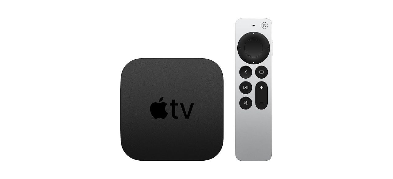 Black 2021 Apple TV 4K device with silver remote on white background