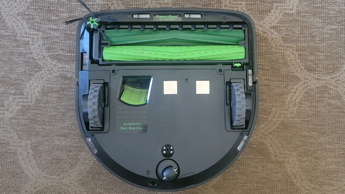 Underside of Roomba showing multisurface rubber brushes