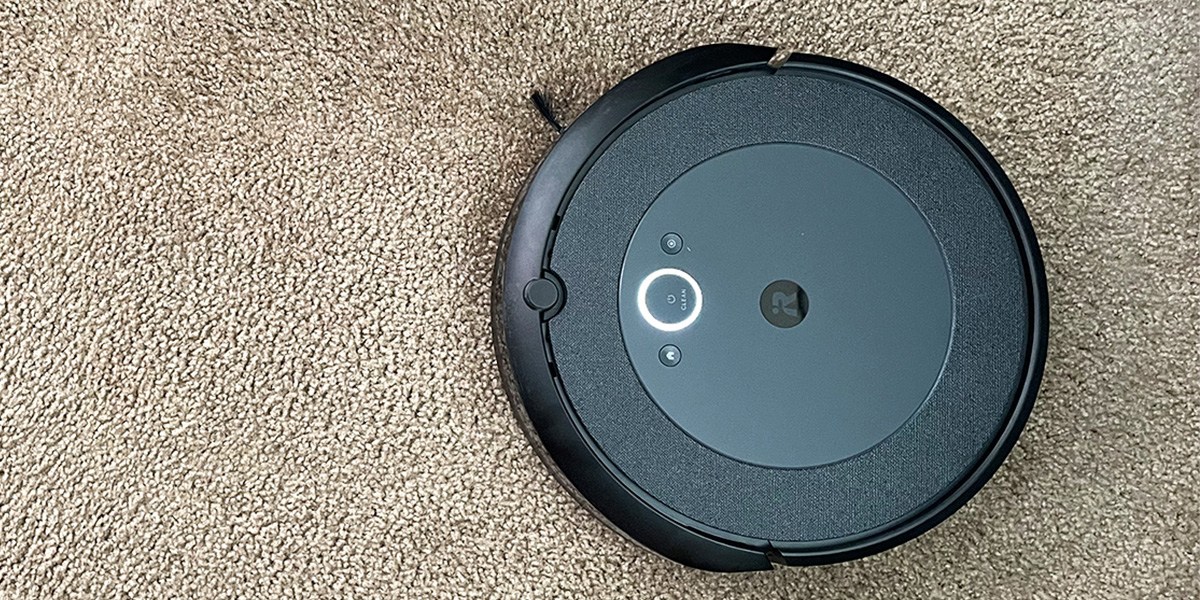 Roomba i4 EVO on tan carpet