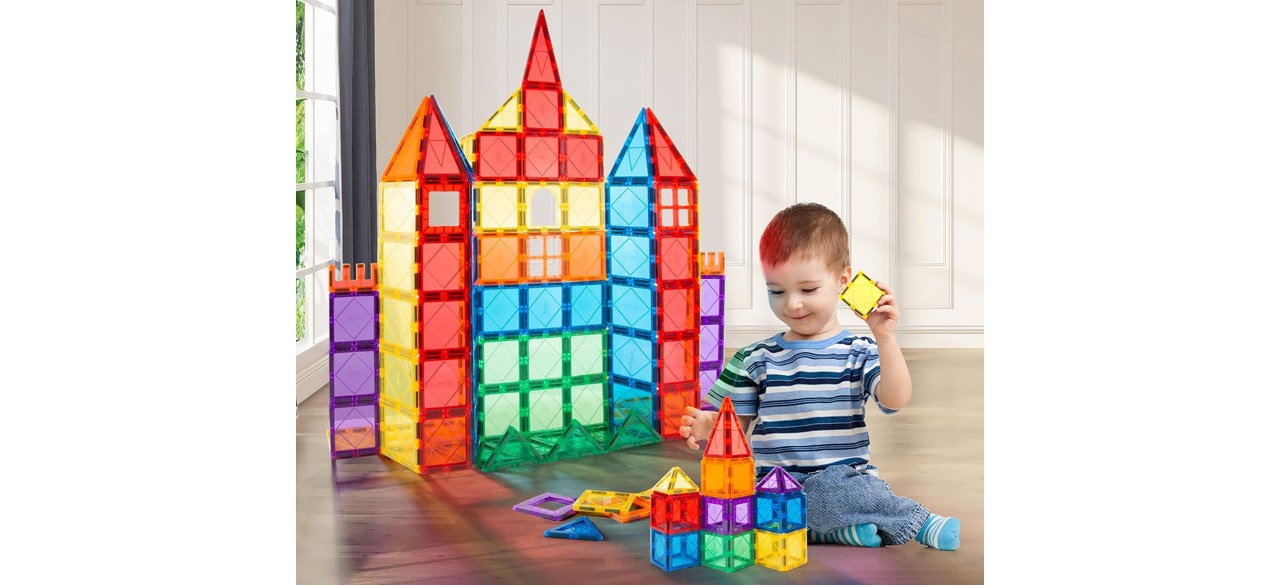 Child playing with MagHub Magnetic Tilestoy