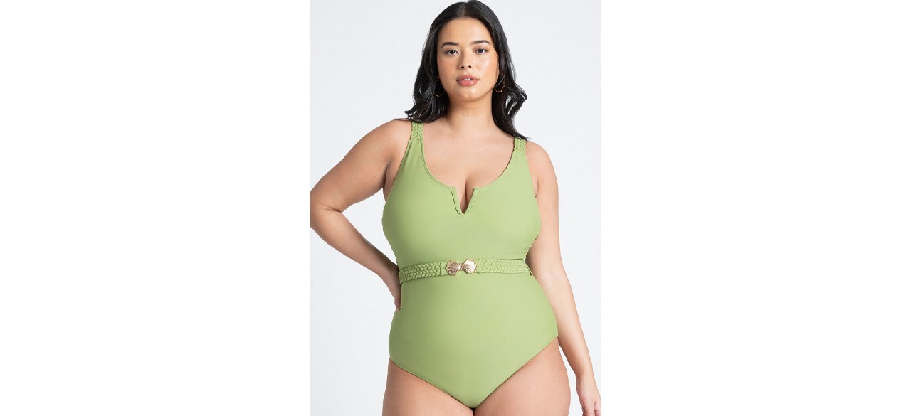 Woman wearing lime green Eloquii Seashell Clasp Belt One Piece