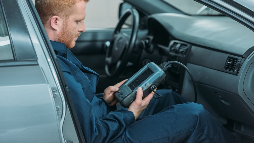 Man uses OBDII scanner