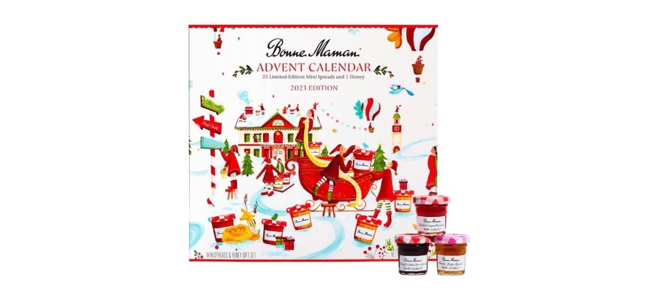 White Advent calendar with image of a Christmas village with jam jars