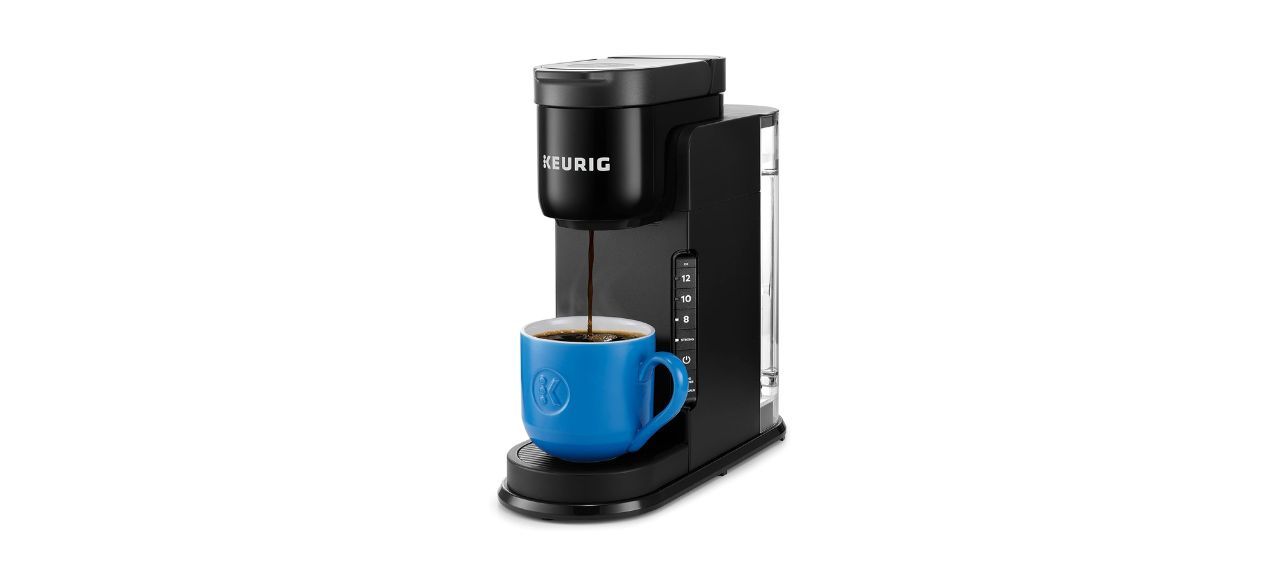 Keurig K-Express coffee maker pouring coffee into a cup