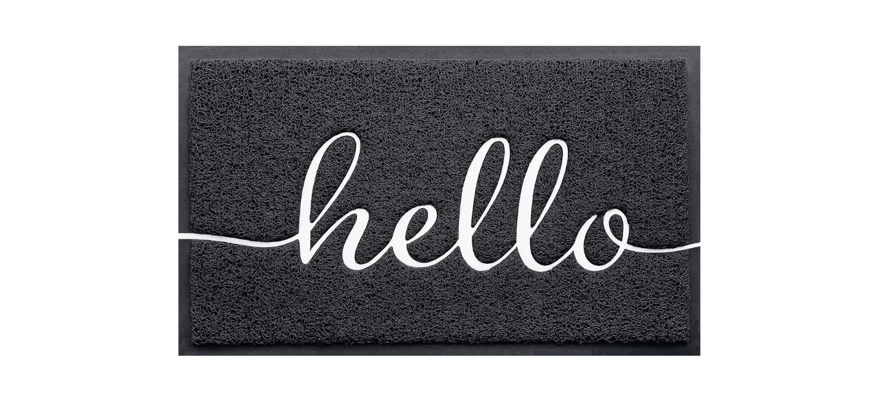 a gray doormat that says "hello" in white script letters