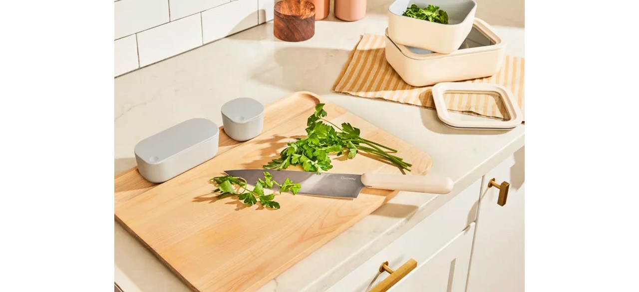 Caraway Cutting Board Set on kitchen counter with chef's knife