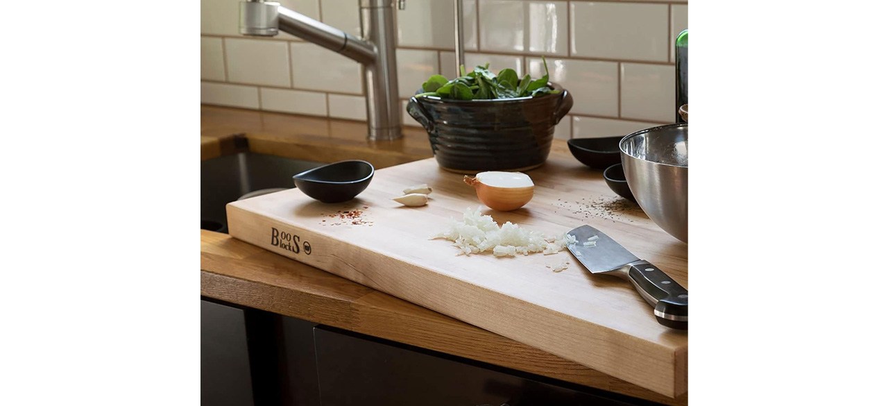 John Boos Maple Cutting Board on kitchen counter next to sink