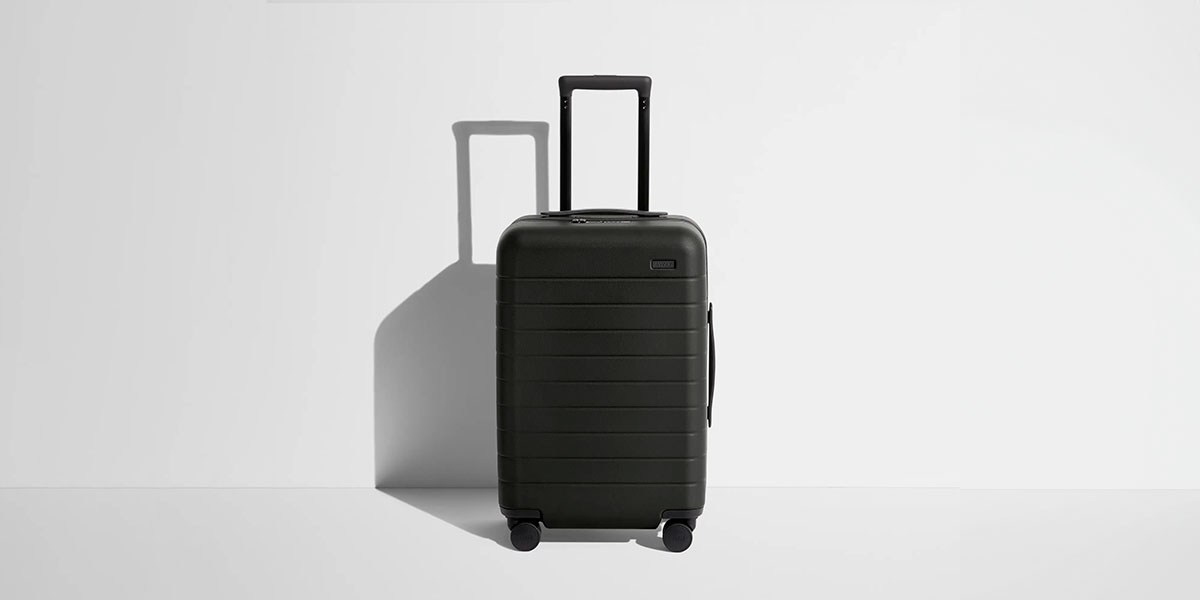 Away Carry-On on gray background