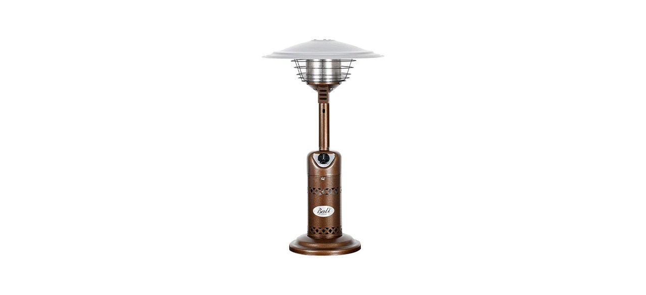 A small brown tabletop heater with a top that looks like an upside-down dish