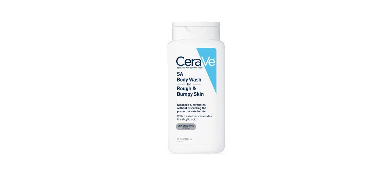 A white and blue bottle of CeraVe body wash. Text on the bottle reads: SA Body Wash for Rough & Bumpy Skin. Cleanses & exfoliates without disrupting the protective skin barrier. With 3 essential ceramides & salicylic acid. Skin smoothing formula.