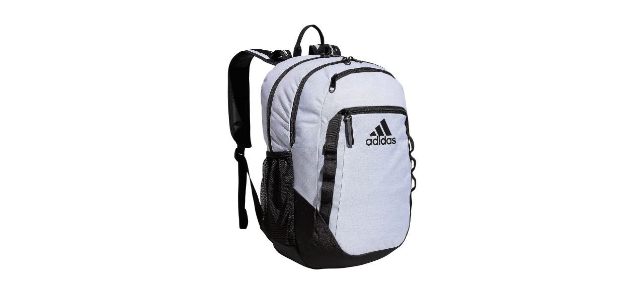 A white backpack with black accents and the adidas logo on it