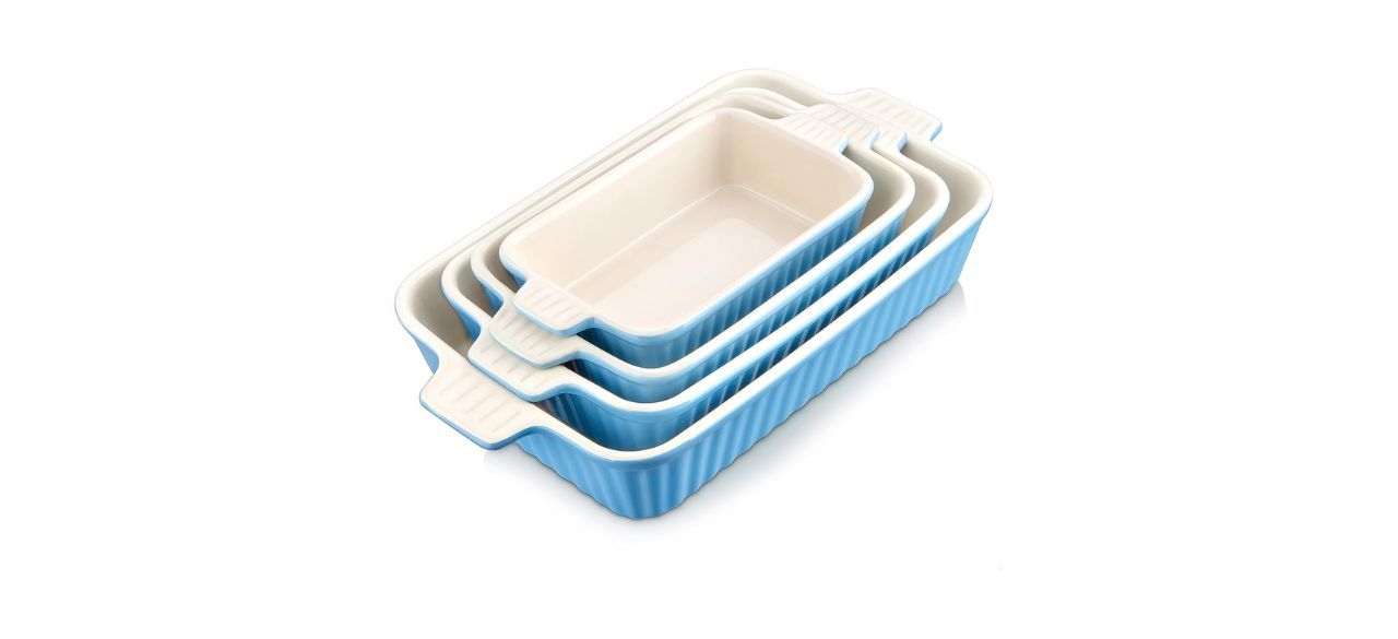 4 rectangular, ceramic casserole dishes of increasing size with blue exteriors