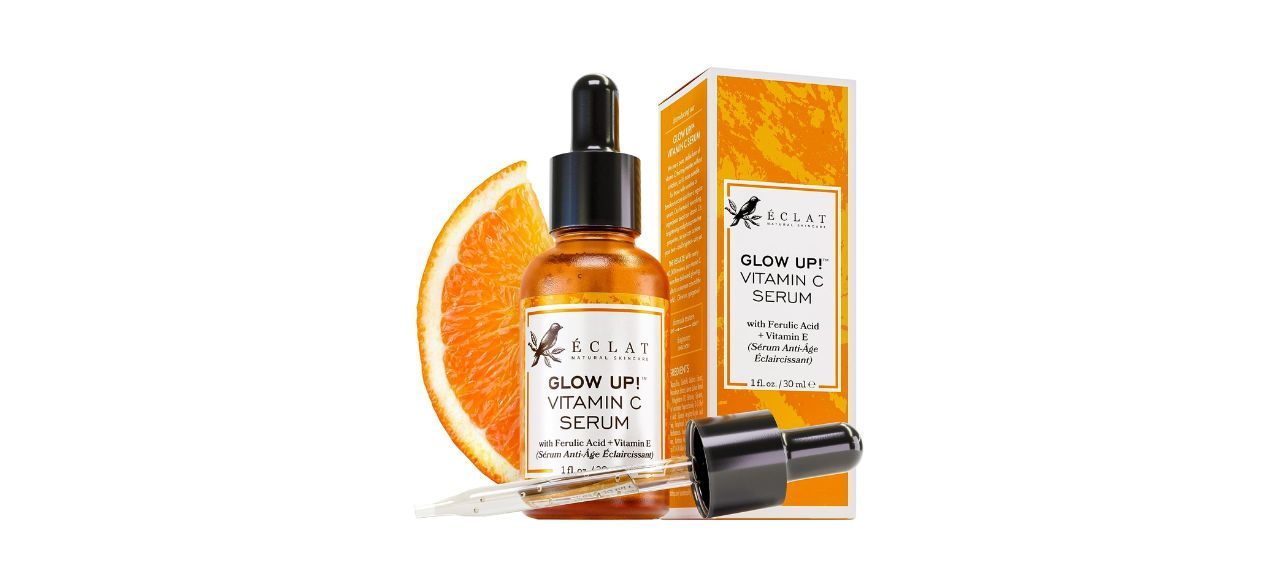 a dropper bottle of orange serum