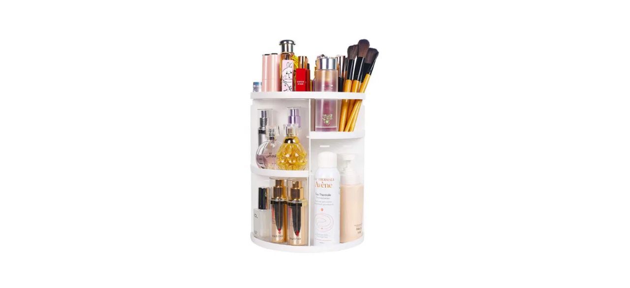 A three-leveled spinning makeup organizer with compartments of varying sizes.