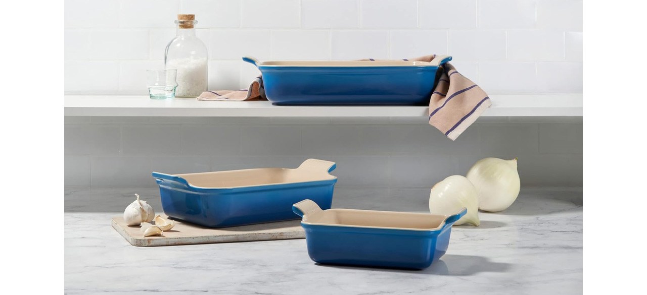 Blue Le Creuset Stoneware Heritage Set 3 Rectangular Dishes on counter