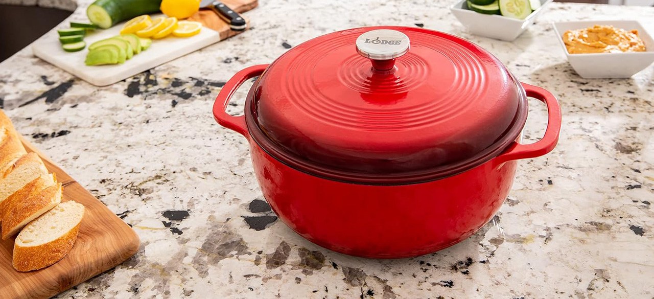 Red Lodge 6 Quart Enameled Cast Iron Dutch Oven with Lid on table