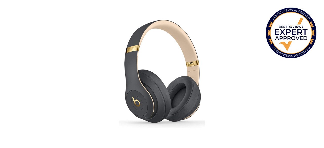 Black and gold headphones on white background