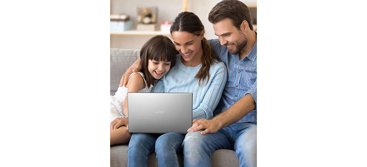 Family looking at Acer Aspire 5