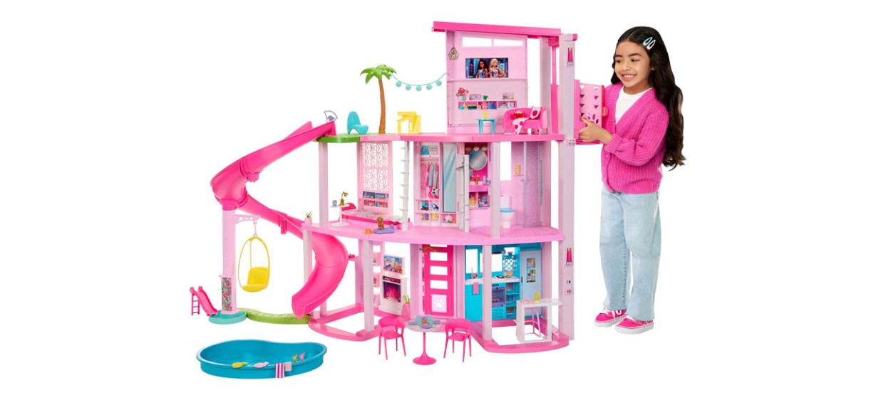 Barbie Dreamhouse Pool Party Doll House in pink; looks just like the dream house in the Barbie movie Barbie Dreamhouse Pool Party Doll House in pink; looks just like the dream house in the Barbie movie