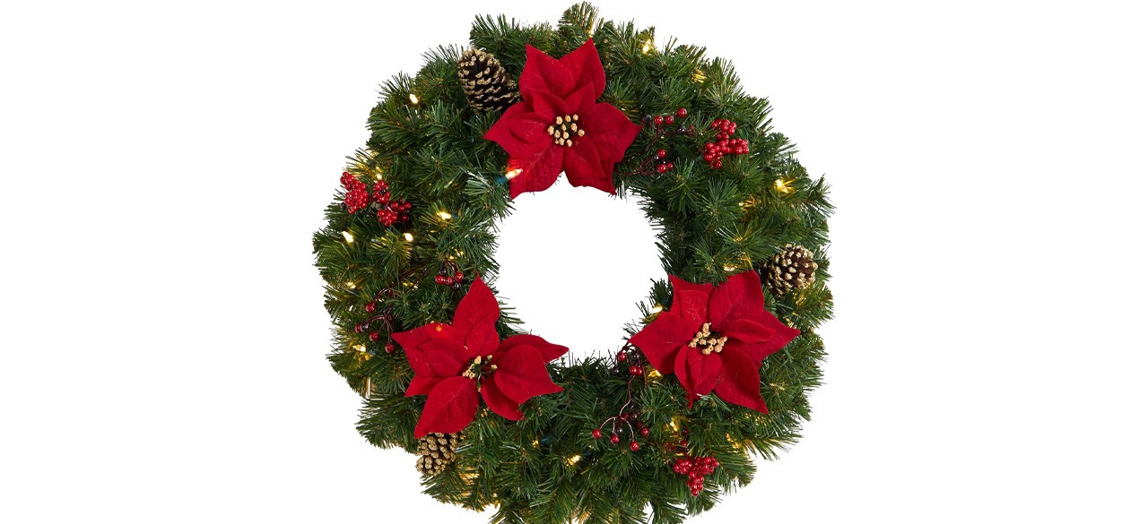 Nearly Natural Store Artificial Wreath with poinsettias and pinecones on it