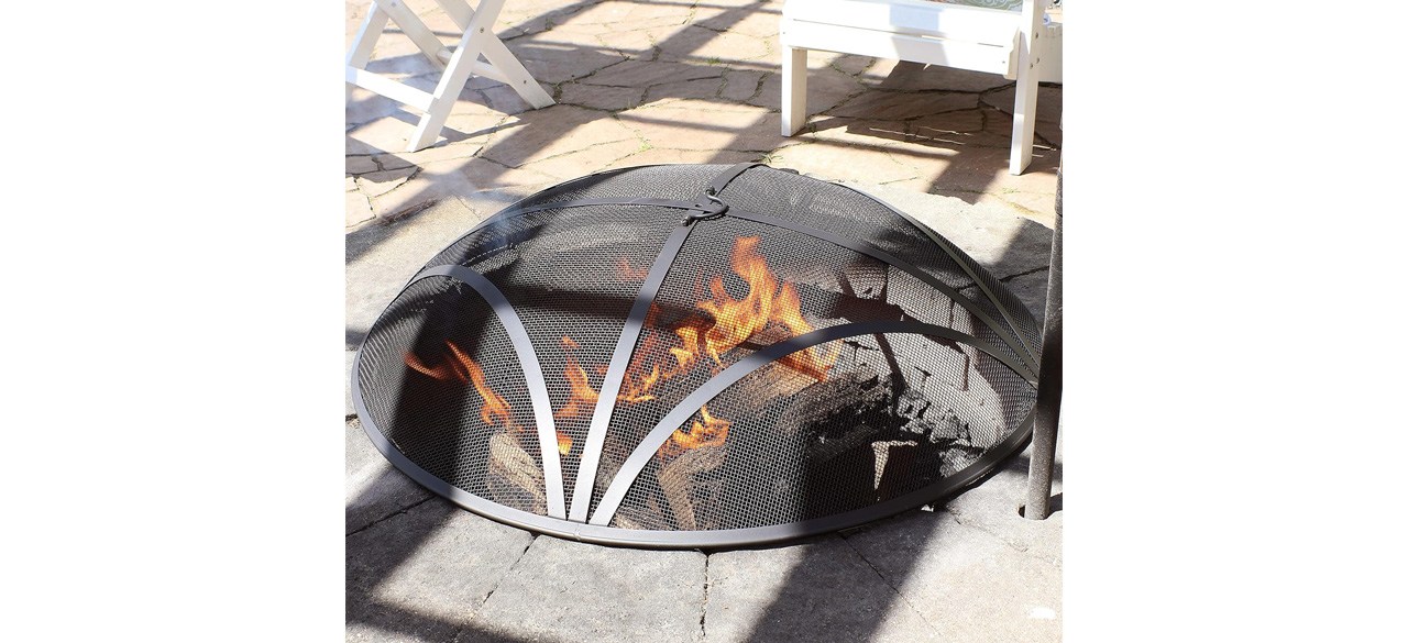 Steel mesh fire pit spark screen over fire pit