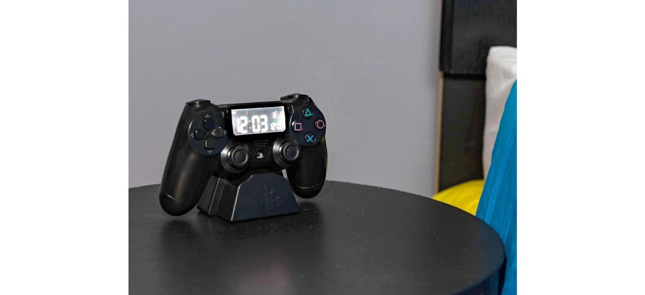 Paladone Playstation Controller Alarm Clock on nightstand