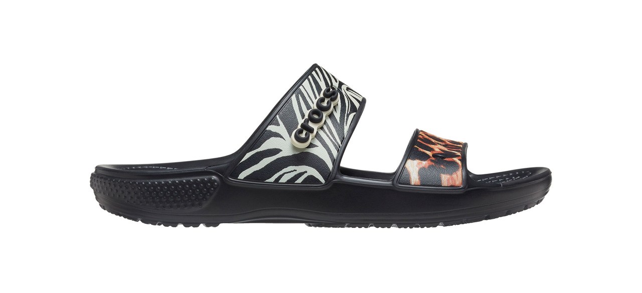 Black sandals with zebra print on one strap and cheetah print on the other strap