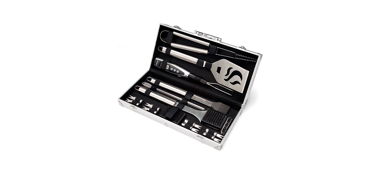 Grilling tools inside of a folding case with elastic restraints