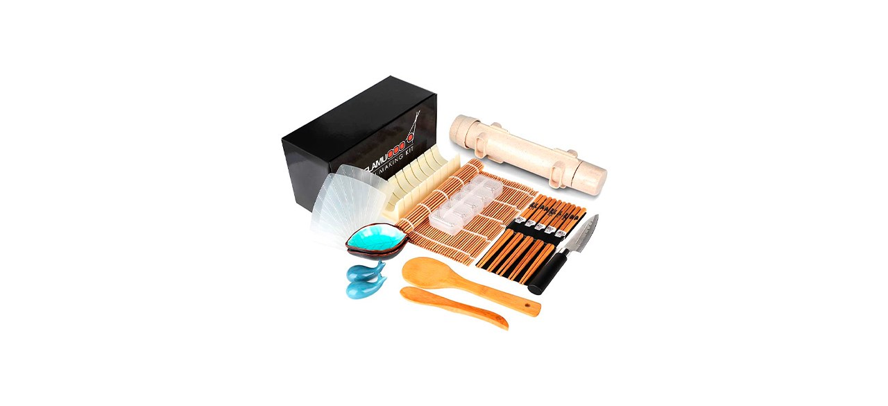 A sushi making kit with a bamboo roller, a knife, a rice mold and other accessories