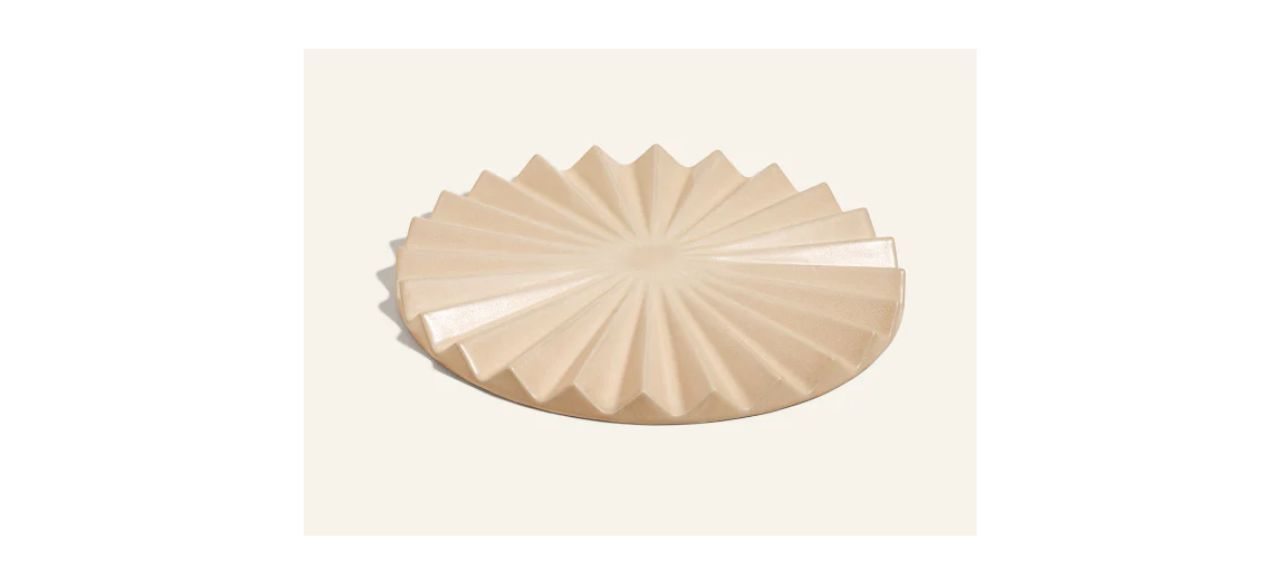 Our Place Pleat Trivet in beige (color: chickpea) on white background