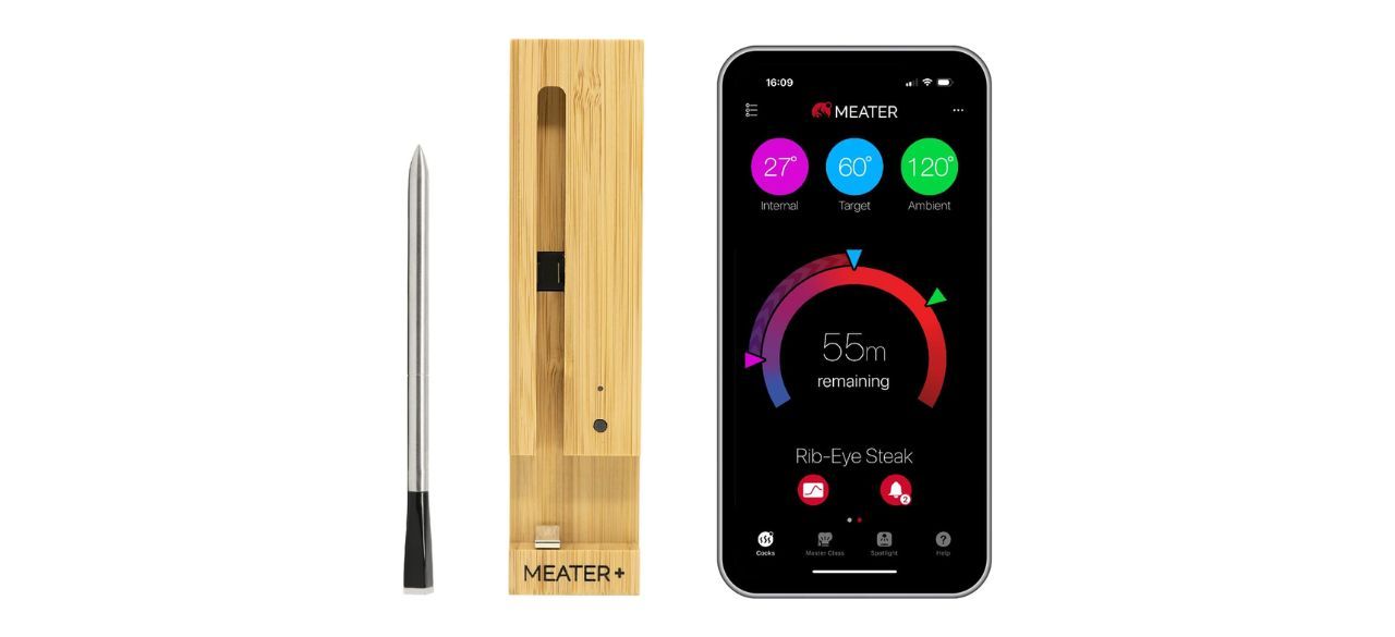 Meater Plus Long Range Wireless Smart Meat Thermometer next to smartphone