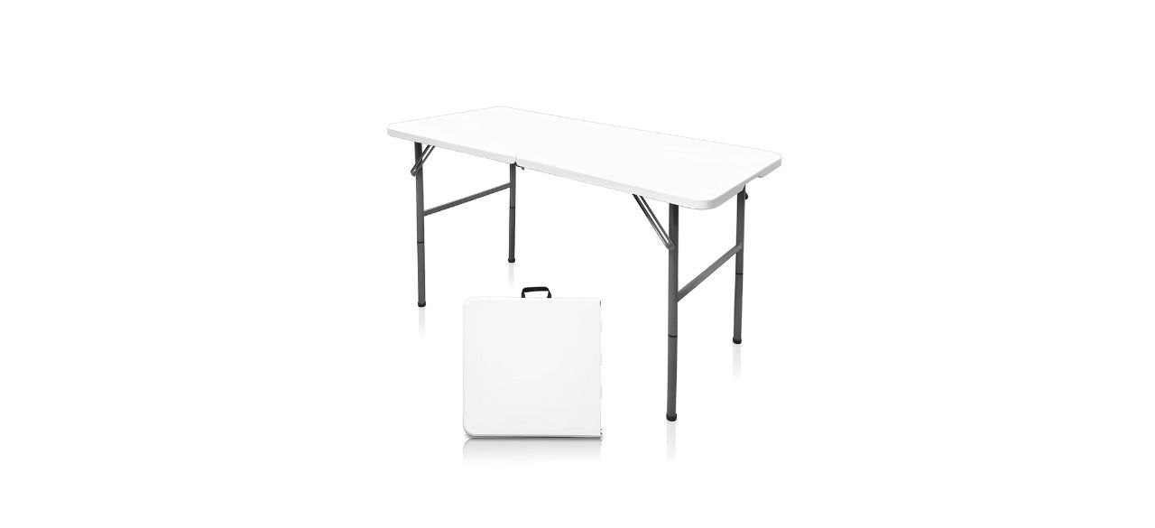 white portable rectangular dining table, shown set up and folded.