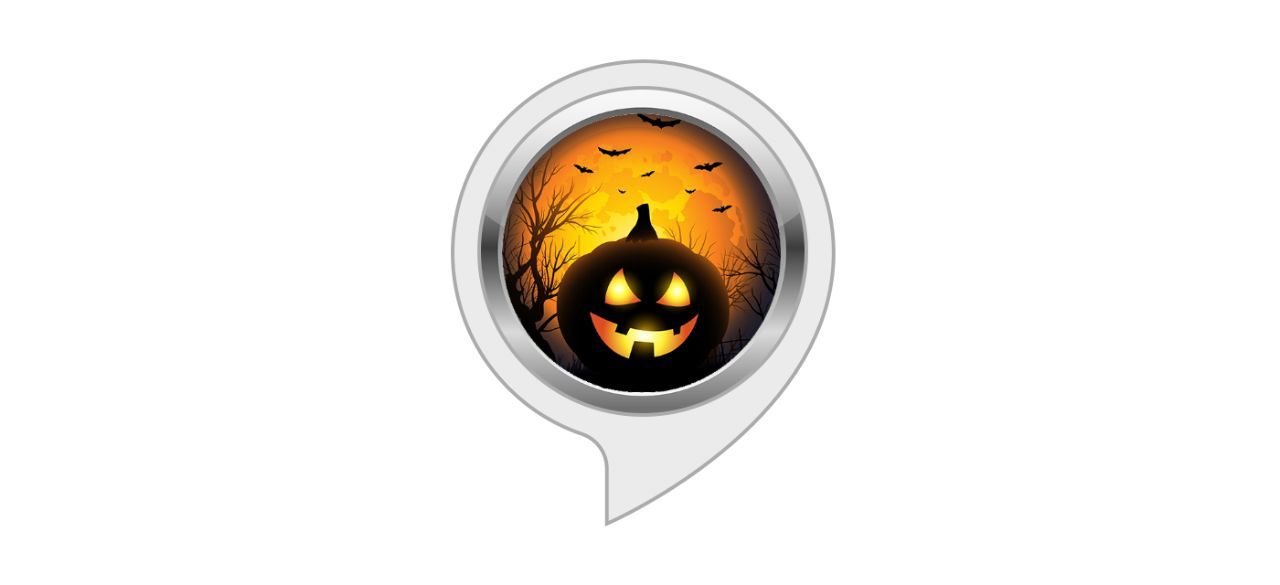 A speech bubble with a picture of a pumpkin in a spooky forest in it