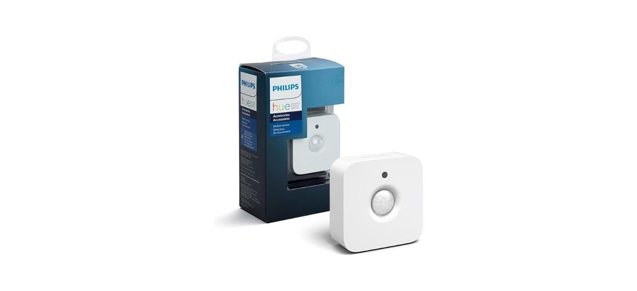 A small, white square indoor motion sensor