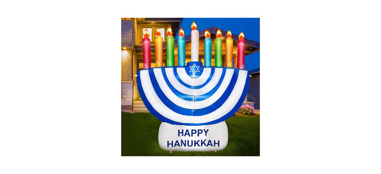 Turnmeon 6-foot inflatable Hanukkah Menorah Decoration With LED Lights with a sign that says 