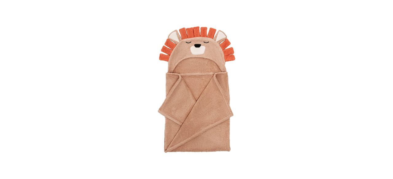 a hooded baby towel (beige) with a lion head on the hood