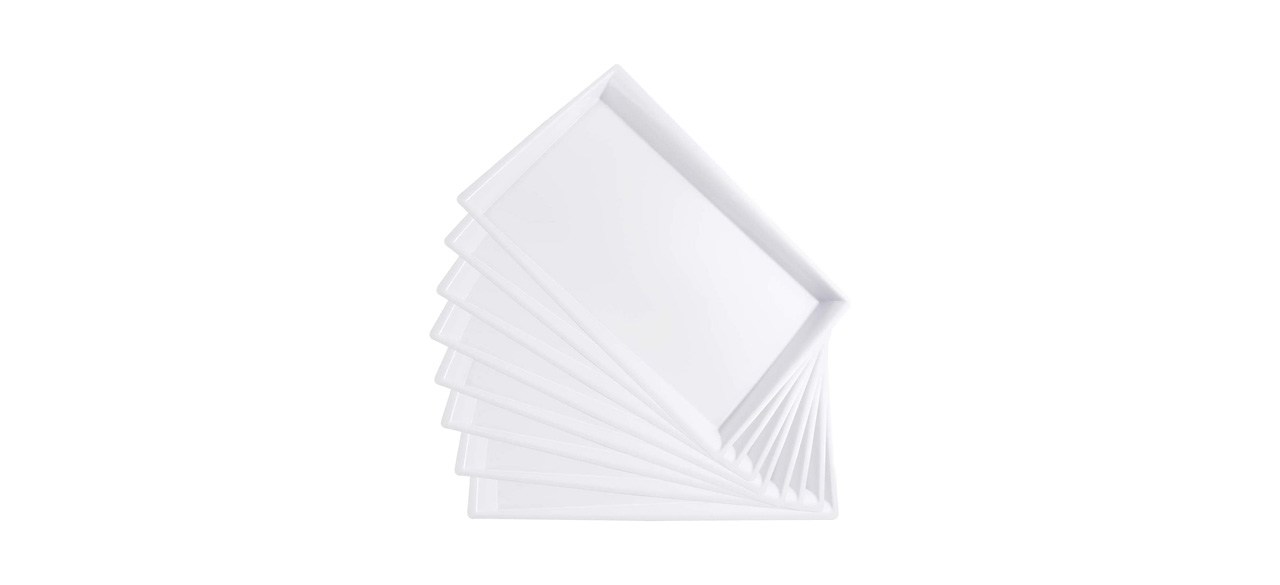 8 white plastic serving trays, rectangular shaped