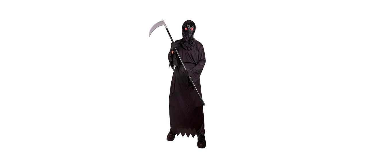 kid wearing grim reaper costume and holding a scythe