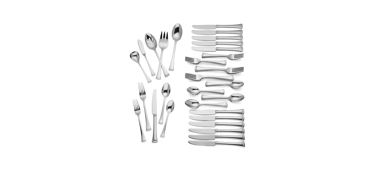 An assortment of knives, forks and spoons of various sizes