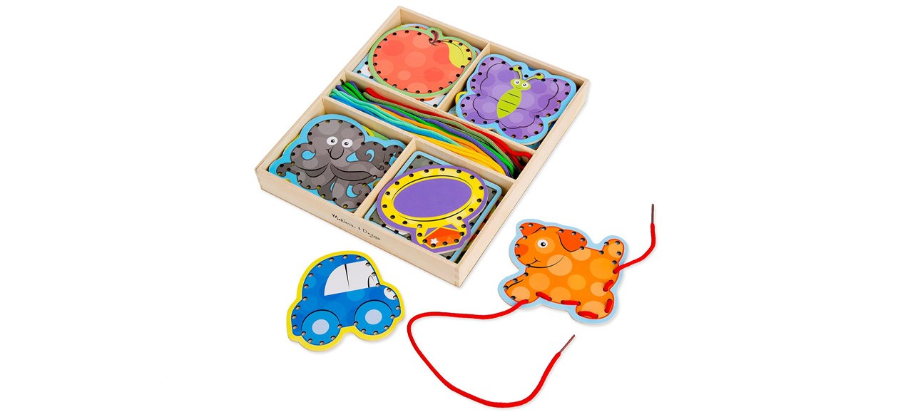 Melissa And Doug Wooden Alphabet Lacing Cards on white background; images of animals