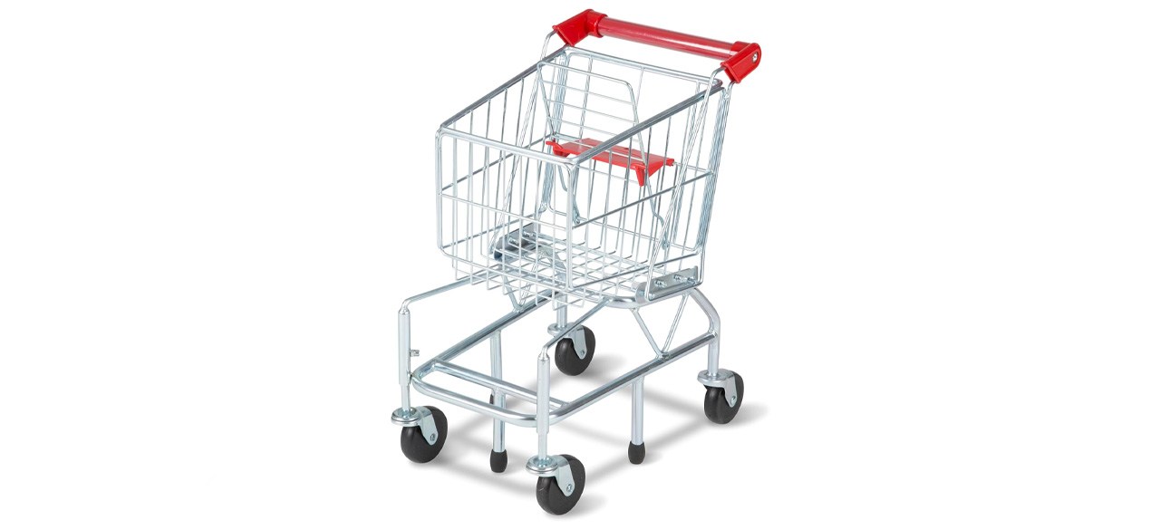 Melissa e carrinho de compras de brinquedos para cães