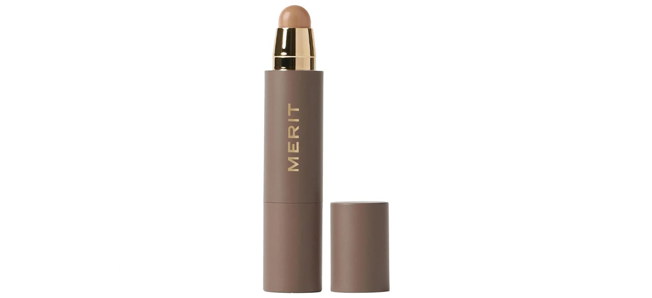 Mérito Minimalist Perfecting Complexion Foundation e Concealer Stick em fundo branco