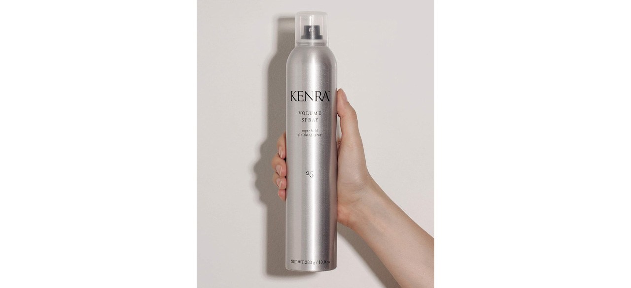 Person holding can of Kenra Volume Spray 25